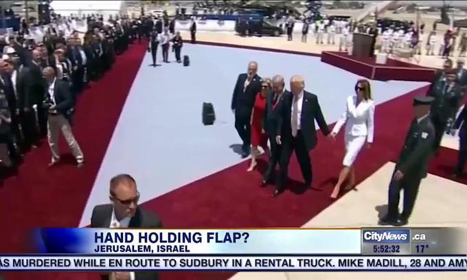 melania_hand_swat